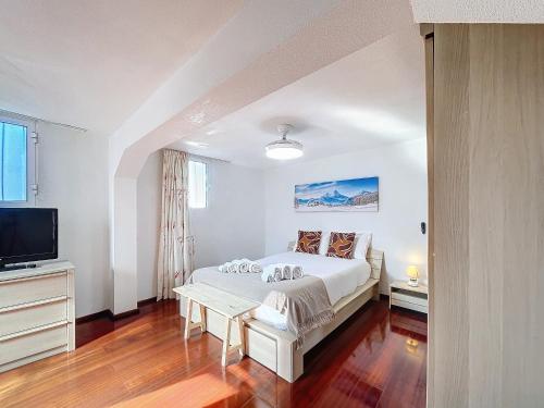 Ένα ή περισσότερα κρεβάτια σε δωμάτιο στο Casa do Figueirinha