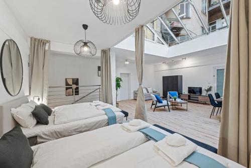 Postel nebo postele na pokoji v ubytování K22 Smart Rooms