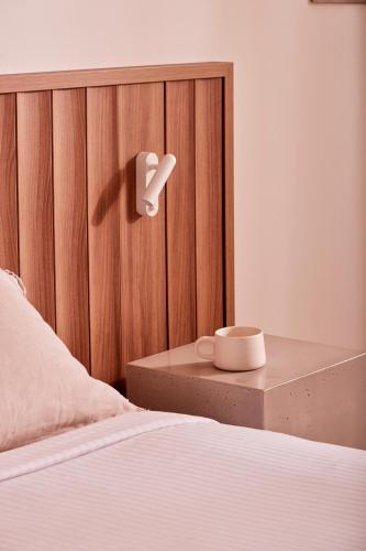 Cama o camas de una habitación en The Hide Byron Bay