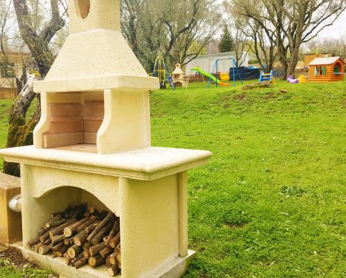 a fire pit with a pile of fire wood at Green Park Hotel & Residence in Bagnara Calabra