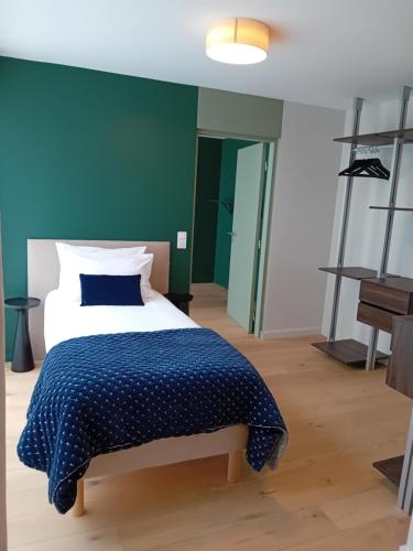Postel nebo postele na pokoji v ubytování theSocial Liveur- SOHO- LES CHARTRONS