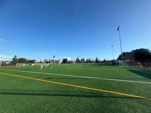 a group of people playing soccer on a field at Launch Promotion Sunnyvale 3B2b Super Big House in Sunnyvale