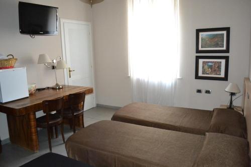 Postel nebo postele na pokoji v ubytování La Casa del Viandante