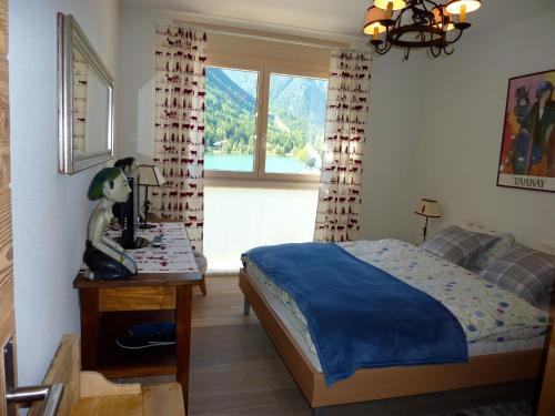 Postel nebo postele na pokoji v ubytování Hotel Mont.Lac