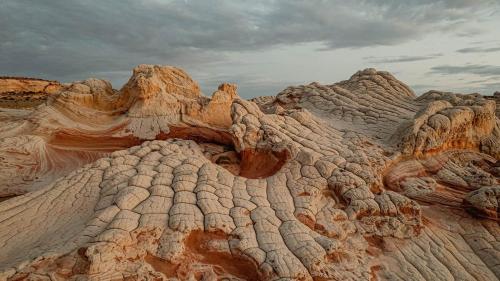 a view of a rocky mountain with a cloudy sky at Mt Carmel Motel in Southern Utah in Mount Carmel