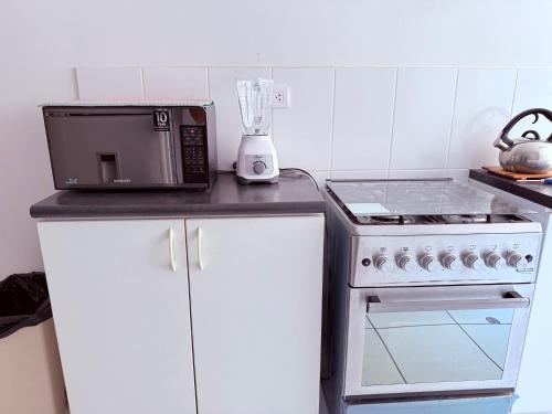Kuchyň nebo kuchyňský kout v ubytování Acogedor Departamento en Lima