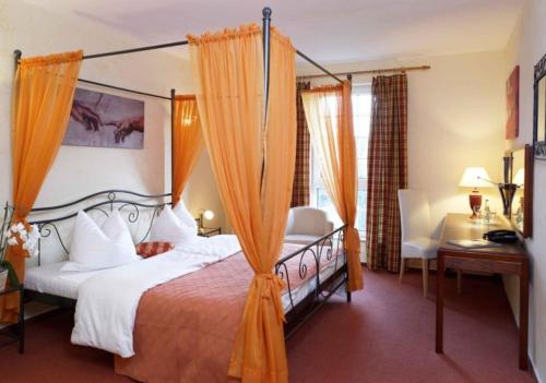 Ένα ή περισσότερα κρεβάτια σε δωμάτιο στο Hotel Villa Magnolia
