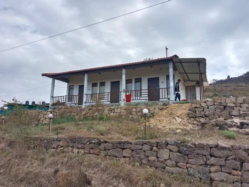 a house on top of a hill at Lawanba Home Stay in Dum-Dum Junction