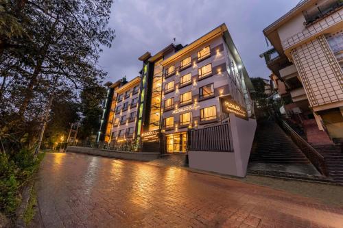 a building on a street with lights on at Medalio Boutique Gangtok with Mountain View in Gangtok