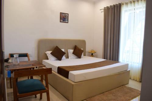 Ένα ή περισσότερα κρεβάτια σε δωμάτιο στο Sarins State Side 'Mistville'