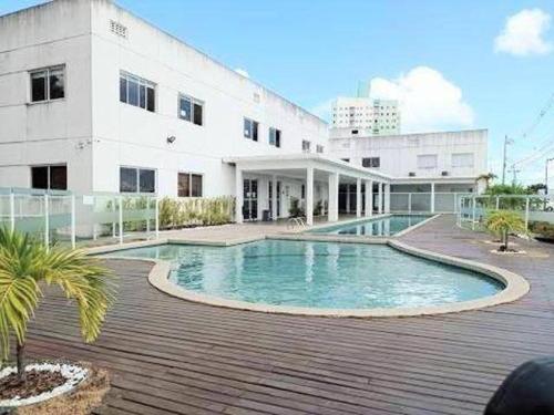 Swimmingpoolen hos eller tæt på Casa cores, 2 quartos, piscina