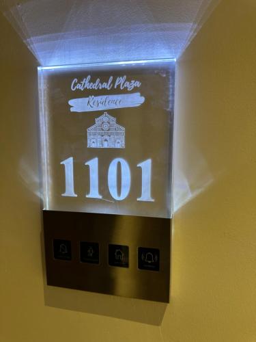 a lightswitch on a wall with a sign that reads at Hotel Boutique Cathedral Plaza Residences room for rent downtown in Bucharest