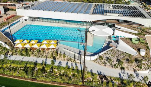 an overhead view of a large swimming pool at Zetland near Shops & Train with Gym&Pool for 6ppl in Sydney