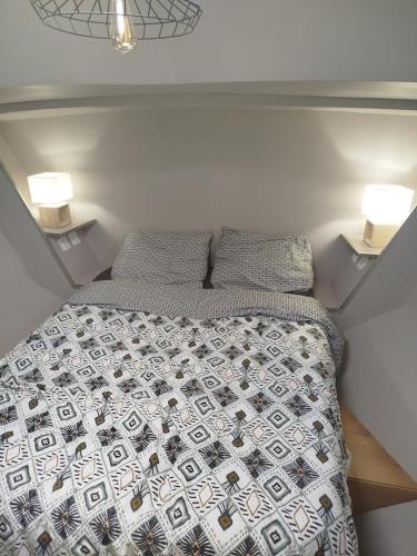 Postel nebo postele na pokoji v ubytování beau bateau spacieux