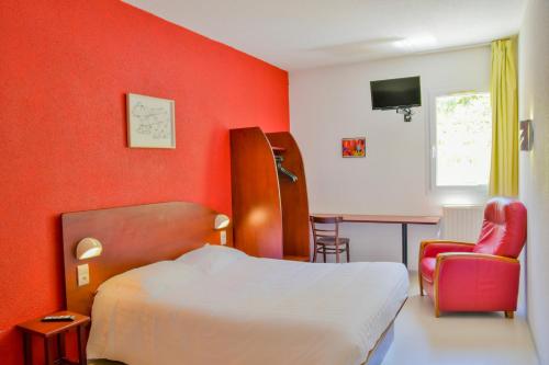 Postel nebo postele na pokoji v ubytování Sev'hotel