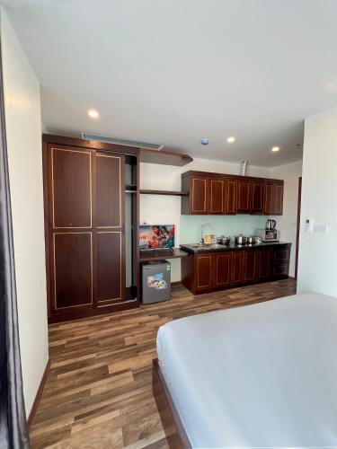 Η κουζίνα ή μικρή κουζίνα στο Hanoi Apartment