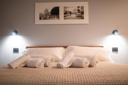 Postel nebo postele na pokoji v ubytování UNA Room
