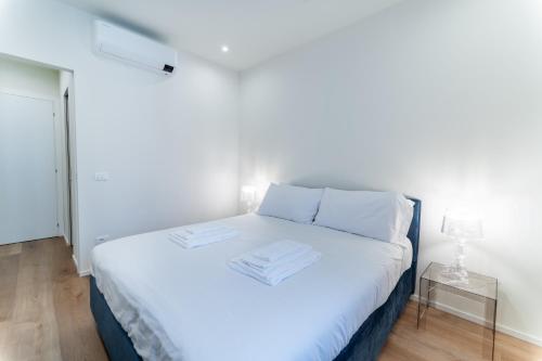 Postel nebo postele na pokoji v ubytování Pico Apartment 50
