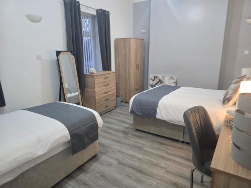 Postel nebo postele na pokoji v ubytování Alma Co-living - Private Room Self-cater