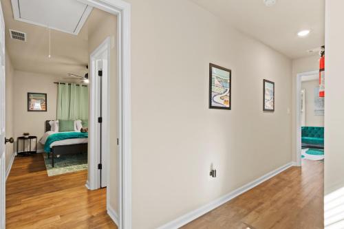a hallway of a home with a bed in the background at Cozy & Spacious 2 King Beds Near UGA & Downtown in Athens
