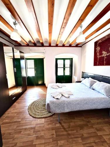 Postel nebo postele na pokoji v ubytování Casa en La Corredera