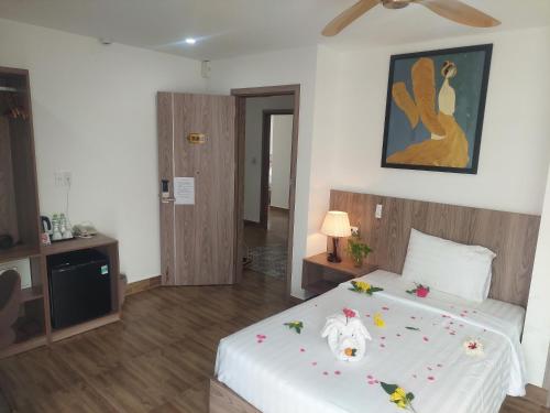 Ένα ή περισσότερα κρεβάτια σε δωμάτιο στο An Villa Beach Paradise