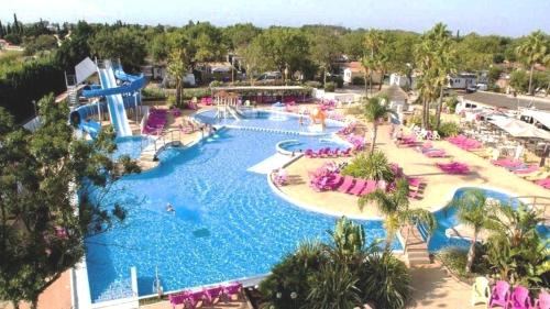 Bungalow Camping 4 etoiles, 6 personnes, climatisation, parking, piscine, Wi-Fi