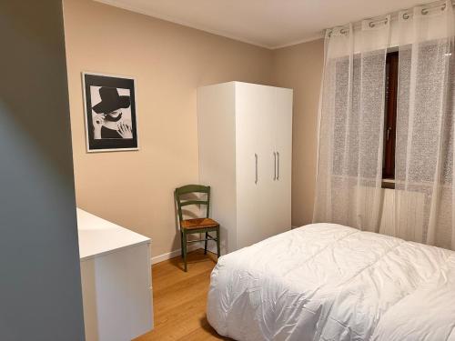 Postel nebo postele na pokoji v ubytování Casa Giulia manerbio