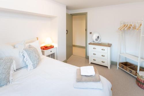 Katil atau katil-katil dalam bilik di Barn Conversion in North Petherton