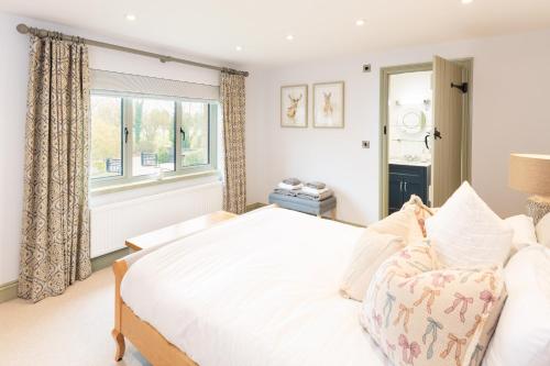 Katil atau katil-katil dalam bilik di Barn Conversion in North Petherton
