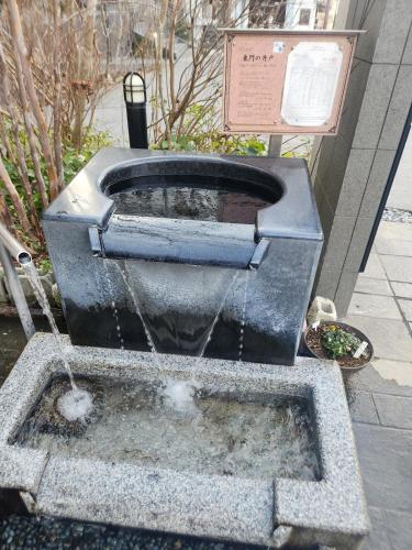 a fountain with water coming out of it at L -scene Centrally located in Matsumoto Maximum 8 people 2 min walk from Matsumoto Castle in Matsumoto