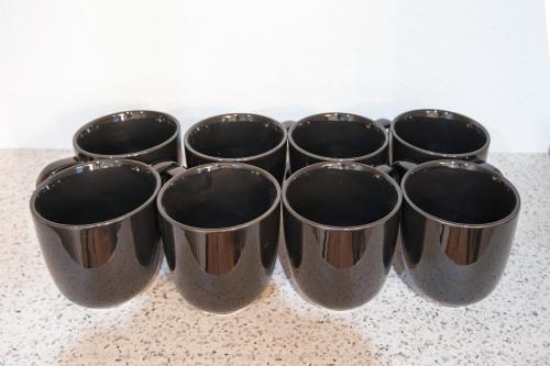 a group of metal cups sitting on a counter at L -scene Centrally located in Matsumoto Maximum 8 people 2 min walk from Matsumoto Castle in Matsumoto