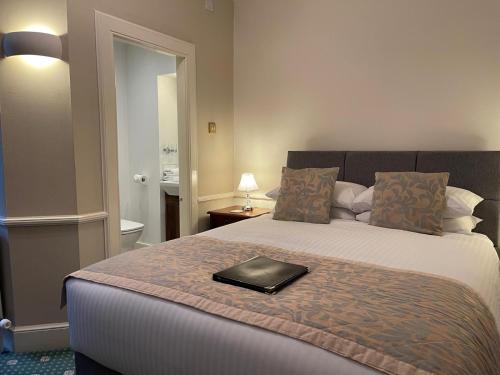Katil atau katil-katil dalam bilik di Ravenscourt House, Guest House