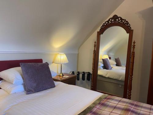 Katil atau katil-katil dalam bilik di Ravenscourt House, Guest House