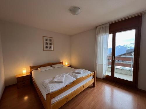 Postel nebo postele na pokoji v ubytování 4 person apartment Loggia with parking