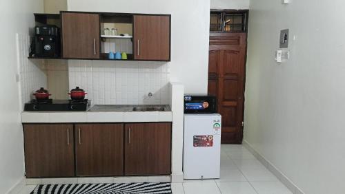 Kuchyň nebo kuchyňský kout v ubytování Comfy home