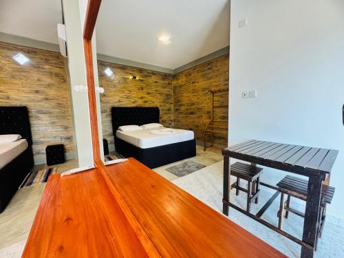 Postel nebo postele na pokoji v ubytování Resolve Garden Hotel