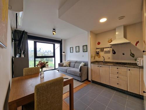 Kuchyň nebo kuchyňský kout v ubytování Apartamentos Ciudad Santiago