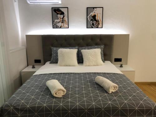Una cama o camas en una habitación de Apartman NINA
