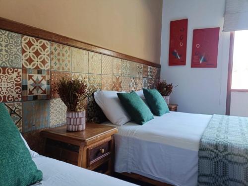 EcoHotel Vale do Solにあるベッド