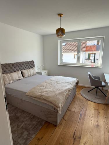 Ένα ή περισσότερα κρεβάτια σε δωμάτιο στο Luxusloft Donauwörth