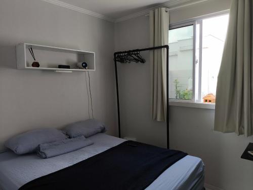 En eller flere senge i et værelse på Paraíso em Aquiraz - Paz, Sol e Mar ao seu Alcance