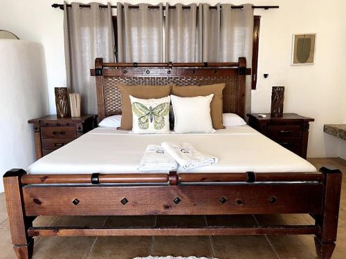 Cama o camas de una habitación en Front Beach Punta Rucia Villa