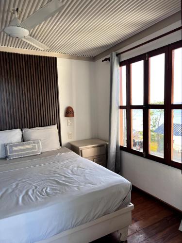Cama o camas de una habitación en Front Beach Punta Rucia Villa