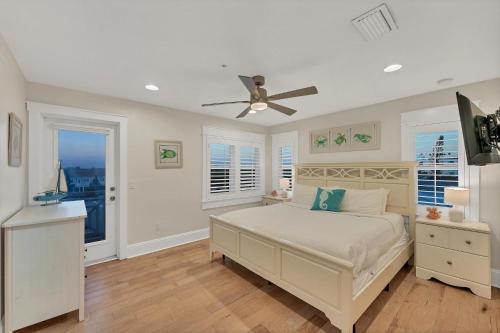 Giường trong phòng chung tại Sunset Gulf