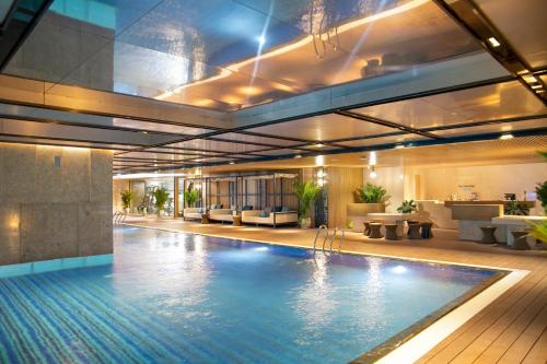 Kolam renang di atau dekat dengan TMS Quy Nhơn - Rosella Apartment