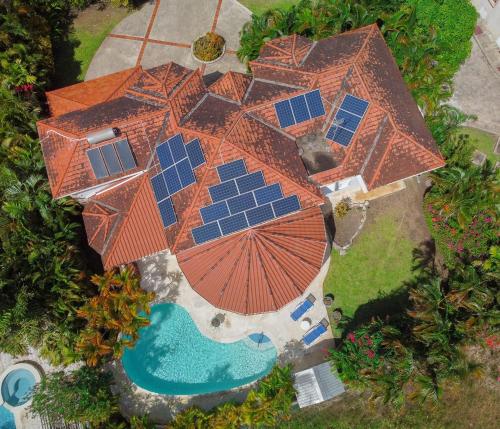 an overhead view of a house with solar panels on it at Marzalea 5 Bd Villa by ZenBreak in Saint James