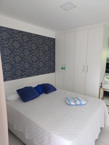 Ένα ή περισσότερα κρεβάτια σε δωμάτιο στο Residencial Brisas de Carapibus