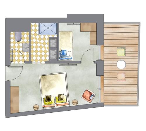 a floor plan of a living room with furniture at Hotel Kristall in Grossarl