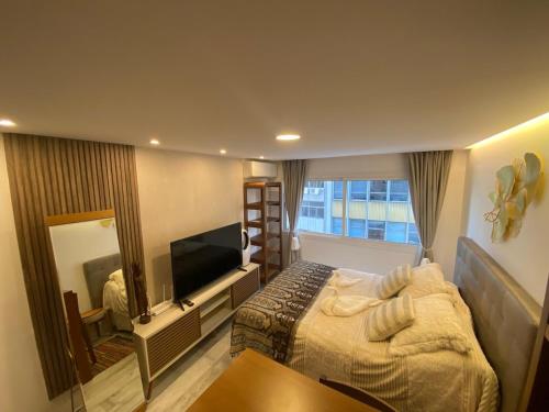 Μια τηλεόραση ή/και κέντρο ψυχαγωγίας στο Apartamento nuevo en excelente lugar